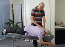 Our Strathpine chiropractor performing an adult chiropractic adjustment