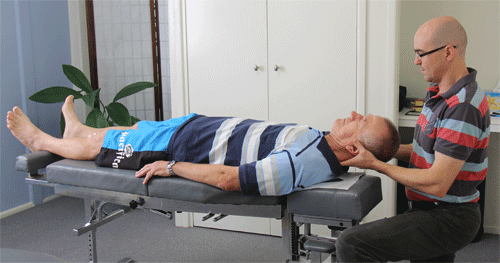 Our Strathpine Chiropractor Dr David Malone adjusting a client